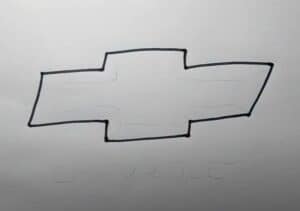 Chevrolet logo drawing tutorial step by step for beginners. How to draw car logos easily, focusing on Chevrolet emblem. Perfect for artists and car enthusiasts learning to sketch vehicle branding symbols.