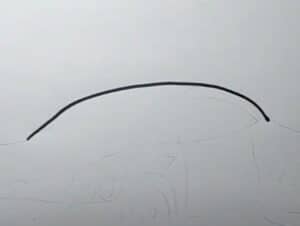 Sketching a car's outline step by step for drawing tutorials on how to draw vehicles.