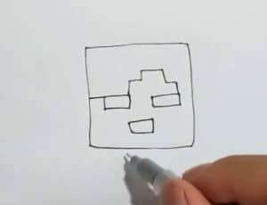 Simple step-by-step sketch of a cartoon face outline, demonstrating drawing techniques for beginners.